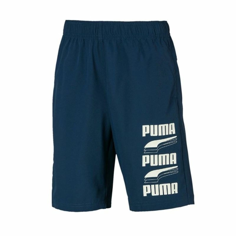 Short de Sport pour Enfants Puma Rebel Bold Bleu foncé - Acheter à 15,41 € seulement chez Collector's Boutique